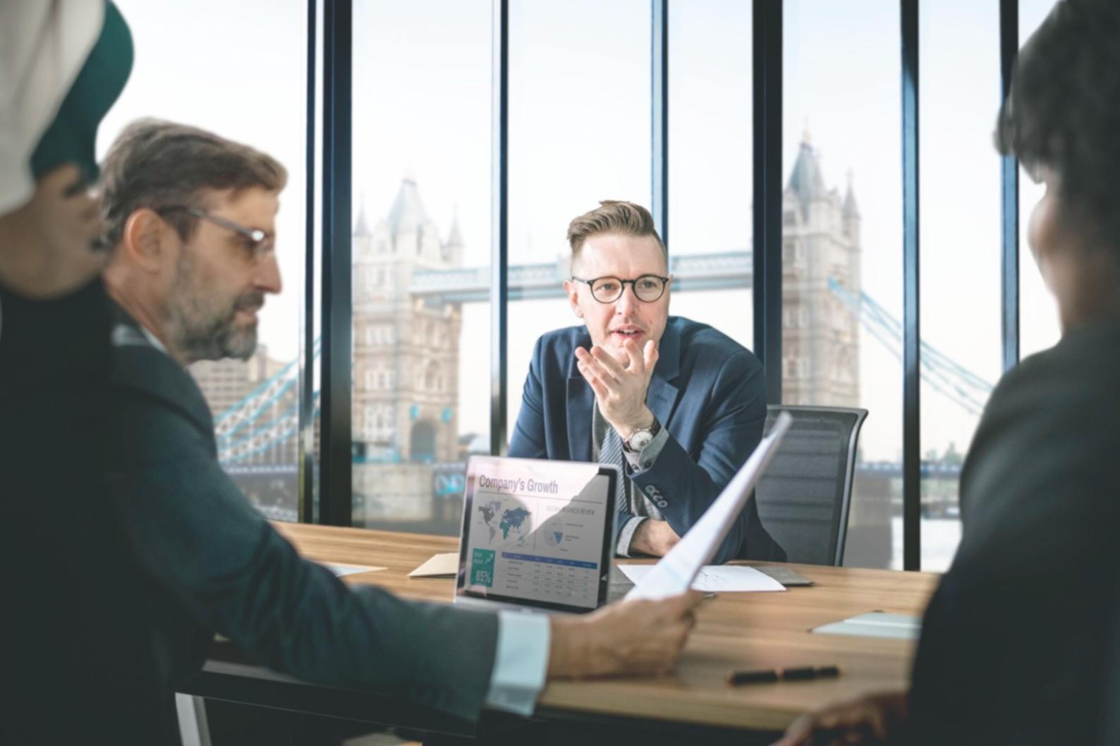 Financial planning workshop in progress showing participants working with budgeting tools